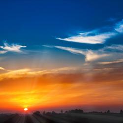 Reddish sunsets or sunrises aerosol particles